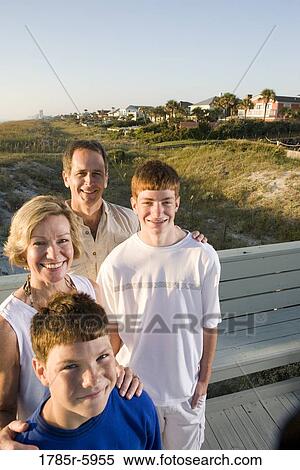 Family vacation at the beach View Large Photo Image Stock Photography - Family vacation at the beach. Fotosearch