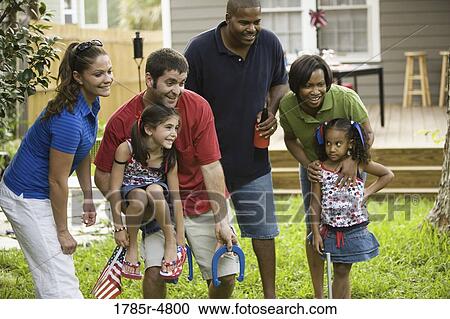 Friendly game of horseshoes View Large Photo Image Stock Image - Friendly game of horseshoes. Fotosearch