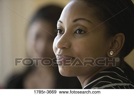 Stock Photo - Head shot of a woman. Fotosearch