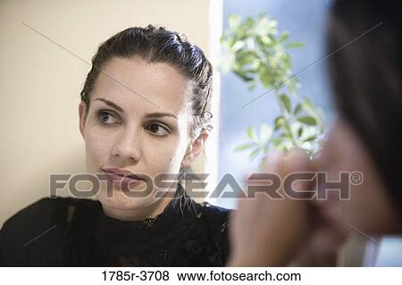 Stock Photo - Head shot of a woman. Fotosearch