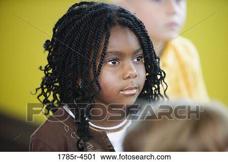 Head-shot of a young girl View Large Photo Image Stock Image - Head-shot of a young girl. Fotosearch