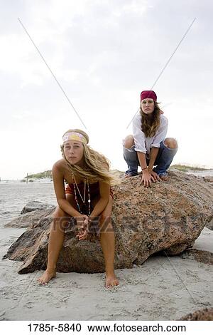 Hippies hanging out at the beach View Large Photo Image Stock Image - Hippies hanging out at the beach. Fotosearch