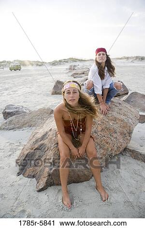 Hippies hanging out at the beach View Large Photo Image Stock Image - Hippies hanging out at the beach. Fotosearch