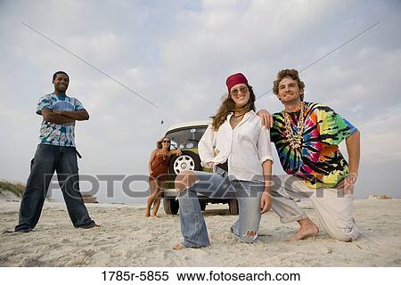 Hippies hanging out at the beach View Large Photo Image Stock Photography - Hippies hanging out at the beach. Fotosearch