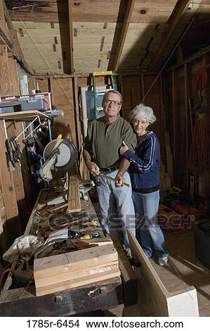 Mature couple in toolshed View Large Photo Image Picture - Mature couple in toolshed. Fotosearch
