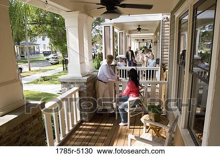 Next-door neighbors on front porches View Large Photo Image Stock Image - Next-door neighbors on front porches. Fotosearch