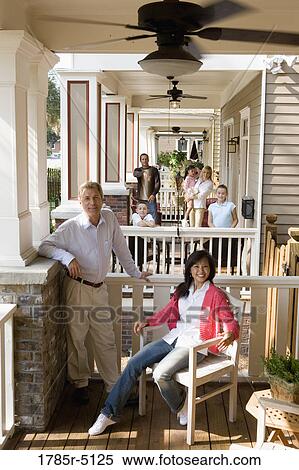 Next-door neighbors on front porches View Large Photo Image Stock Photography - Next-door neighbors on front porches. Fotosearch