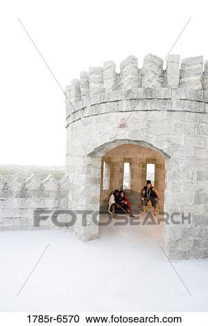 Pirates sitting on the ground inside a castle turret View Large Photo Image Stock Image - Pirates sitting on the ground inside a castle turret. Fotosearch