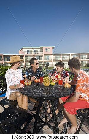 Portrait of a family enjoying tropical vacation View Large Photo Image Stock Image - Portrait of a family enjoying tropical vacation. Fotosearch