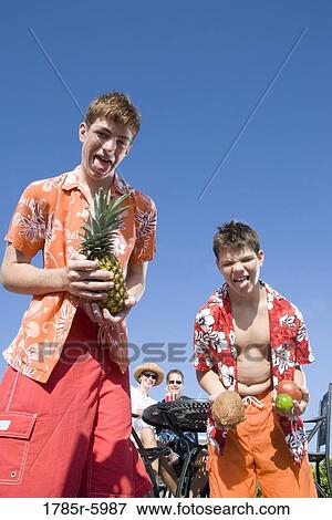 Portrait of a family enjoying tropical vacation View Large Photo Image Stock Photo - Portrait of a family enjoying tropical vacation. Fotosearch