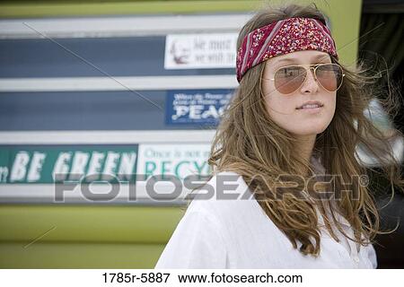 Portrait of a young hippie View Large Photo Image Stock Photo - Portrait of a young hippie. Fotosearch