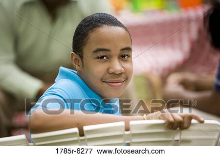 Stock Photo - Portrait of African boy smiling. Fotosearch