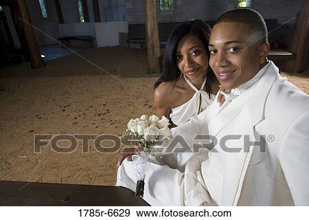 Portrait of bride and groom in whiteinside a medieval castle View Large Photo Image Stock Photo - Portrait of bride and groom in whiteinside a medieval castle. Fotosearch