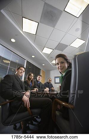 Picture - Portrait of business executives in a formal conference room. Fotosearch