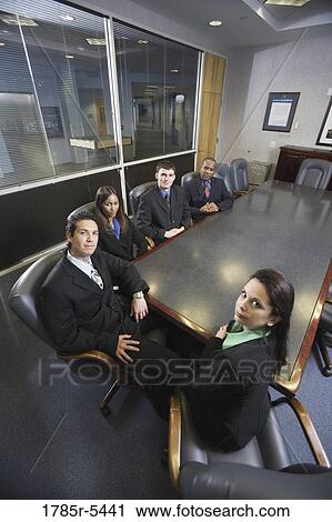 Portrait of business executives in a formal conference room View Large Photo Image Stock Image - Portrait of business executives in a formal conference room. Fotosearch