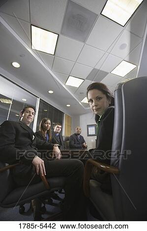 Portrait of business executives in a formal conference room View Large Photo Image Stock Image - Portrait of business executives in a formal conference room. Fotosearch