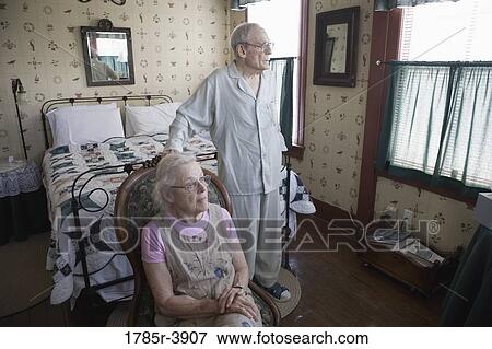 Portrait of feeble senior couple in bedroom View Large Photo Image Stock Photo - Portrait of feeble senior couple in bedroom. Fotosearch