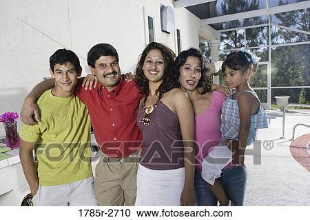 Portrait of Indian family on a patio by an outdoor kitchen View Large Photo Image Stock Image - Portrait of Indian family on a patio by an outdoor kitchen. Fotosearch