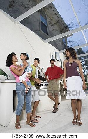 Portrait of Indian family on a patio by an outdoor kitchen View Large Photo Image Stock Photo - Portrait of Indian family on a patio by an outdoor kitchen. Fotosearch