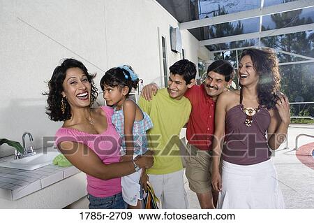 Portrait of Indian family on a patio by an outdoor kitchen View Large Photo Image Stock Photo - Portrait of Indian family on a patio by an outdoor kitchen. Fotosearch