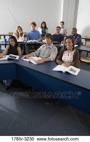 Portrait of students sitting in the classroom View Large Photo Image Stock Image - Portrait of students sitting in the classroom. Fotosearch