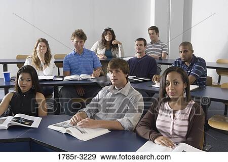 Stock Photo - Portrait of students sitting in the classroom. Fotosearch