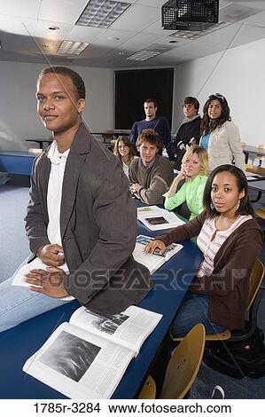 Portrait of Teacher and students in the classroom View Large Photo Image Picture - Portrait of Teacher and students in the classroom. Fotosearch