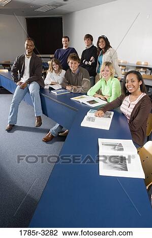 Portrait of Teacher and students in the classroom View Large Photo Image Stock Image - Portrait of Teacher and students in the classroom. Fotosearch