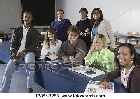 Portrait of Teacher and students in the classroom View Large Photo Image Stock Image - Portrait of Teacher and students in the classroom. Fotosearch
