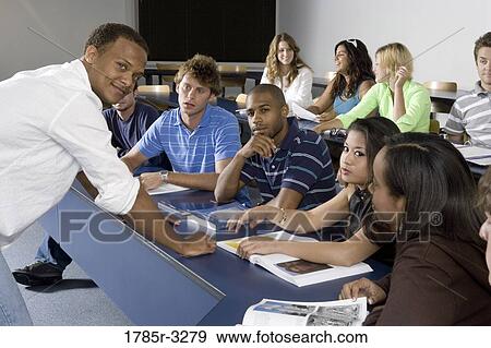 Portrait of Teacher and students in the classroom View Large Photo Image Stock Photo - Portrait of Teacher and students in the classroom. Fotosearch