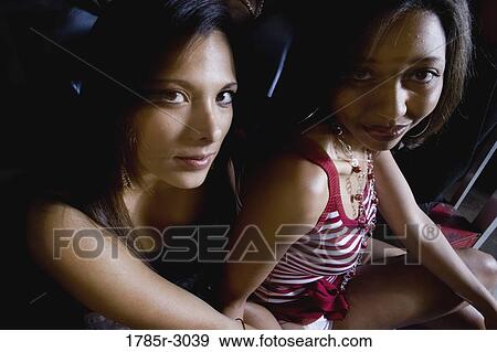 Portrait of two young sexy women View Large Photo Image Stock Photo - Portrait of two young sexy women. Fotosearch