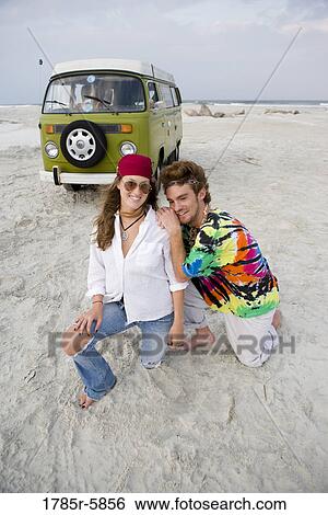 Portrait of young hippie couple at the beach View Large Photo Image Stock Photograph - Portrait of young hippie couple at the beach. Fotosearch