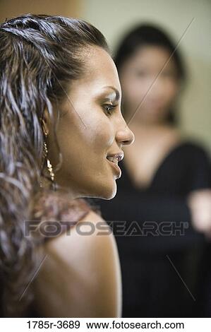 Profile of a businesswoman in a meeting View Large Photo Image Stock Photo - Profile of a businesswoman in a meeting. Fotosearch