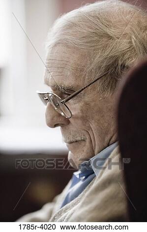 Stock Image - Profile of a senior man in contemplation. Fotosearch