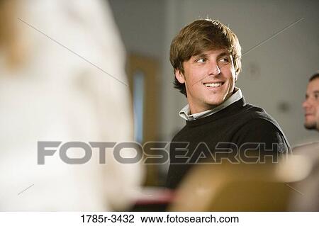 Student sitting in the classroom View Large Photo Image Stock Image - Student sitting in the classroom. Fotosearch