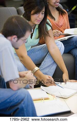 Students comparing notes View Large Photo Image Stock Image - Students comparing notes. Fotosearch