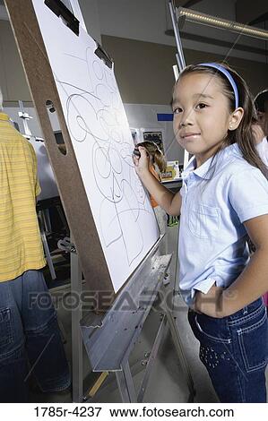 Students drawing on easels in art class View Large Photo Image Stock Photo - Students drawing on easels in art class. Fotosearch