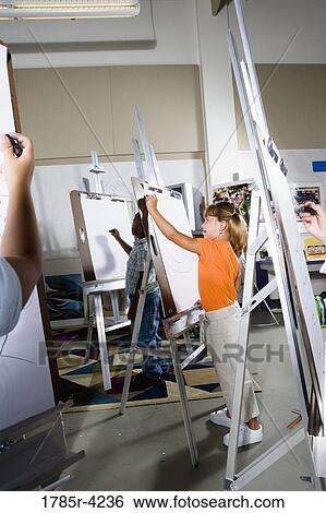 Students drawing on easels in art class View Large Photo Image Stock Photograph - Students drawing on easels in art class. Fotosearch