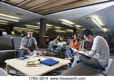 Students in library sitting on sofas studying View Large Photo Image Picture - Students in library sitting on sofas studying. Fotosearch