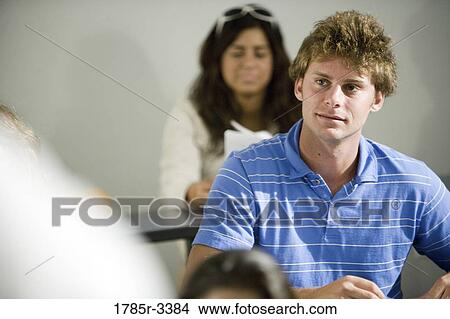 Students sitting in the classroom View Large Photo Image Picture - Students sitting in the classroom. Fotosearch