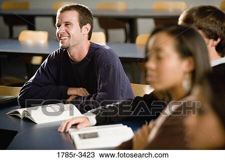Students sitting in the classroom View Large Photo Image Stock Image - Students sitting in the classroom. Fotosearch