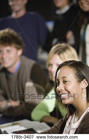 Students sitting in the classroom View Large Photo Image Stock Photo - Students sitting in the classroom. Fotosearch
