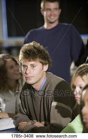Students sitting in the classroom View Large Photo Image Stock Photo - Students sitting in the classroom. Fotosearch
