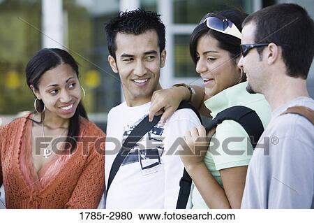 Students standing side by side and smiling View Large Photo Image Stock Image - Students standing side by side and smiling. Fotosearch