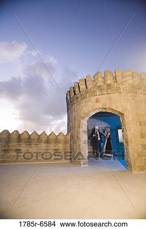 View of a navy officer and a princess standing in a castle turret View Large Photo Image Picture - View of a navy officer and a princess standing in a castle turret. Fotosearch