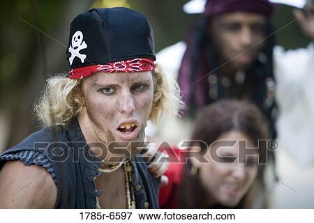 View of pirates armed with a gun and swords View Large Photo Image Stock Photo - View of pirates armed with a gun and swords. Fotosearch
