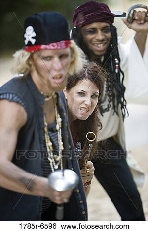 View of pirates armed with a gun and swords View Large Photo Image Stock Photograph - View of pirates armed with a gun and swords. Fotosearch