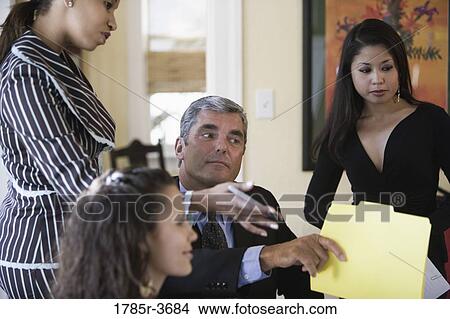 Women entrepreneurs in a business meeting View Large Photo Image Picture - Women entrepreneurs in a business meeting. Fotosearch