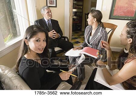 Stock Image - Women entrepreneurs in a business meeting. Fotosearch