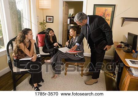 Women entrepreneurs in a business meeting View Large Photo Image Stock Image - Women entrepreneurs in a business meeting. Fotosearch